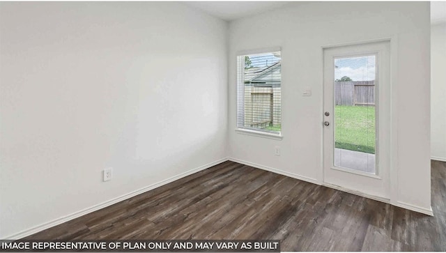 entryway with dark wood-type flooring