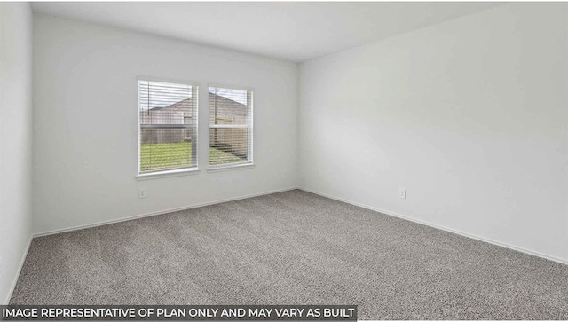 spare room featuring carpet flooring