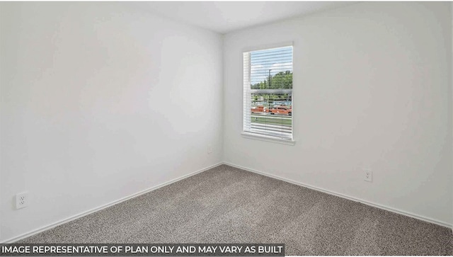 empty room with carpet flooring