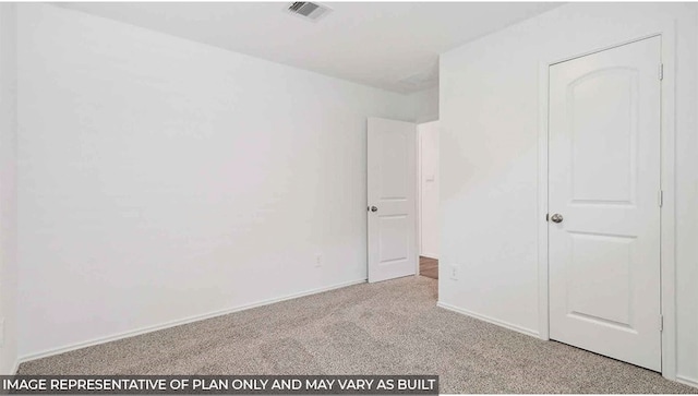 unfurnished bedroom with light colored carpet