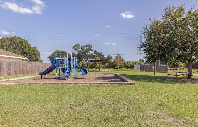 view of jungle gym featuring a yard