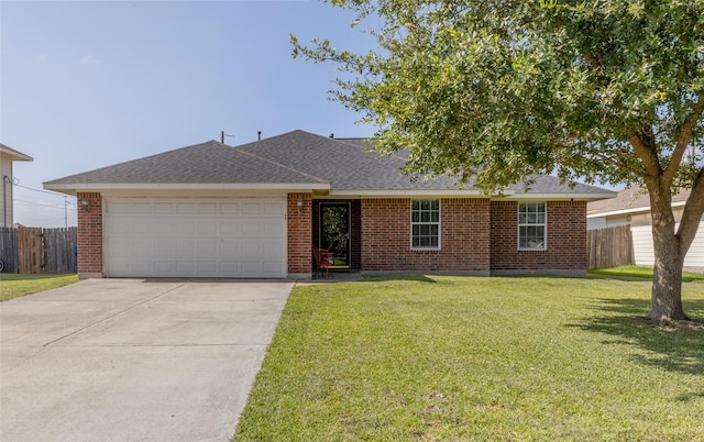 single story home featuring a garage and a front yard