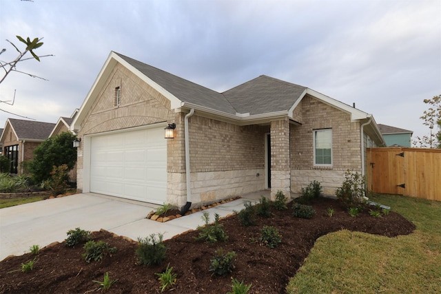 ranch-style house featuring a garage