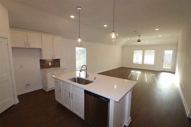 kitchen featuring a kitchen island with sink, dishwasher, white cabinets, and sink