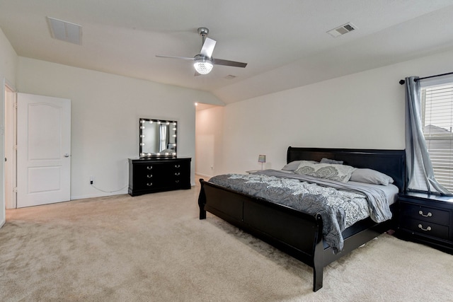 bedroom featuring ceiling fan and light colored carpet