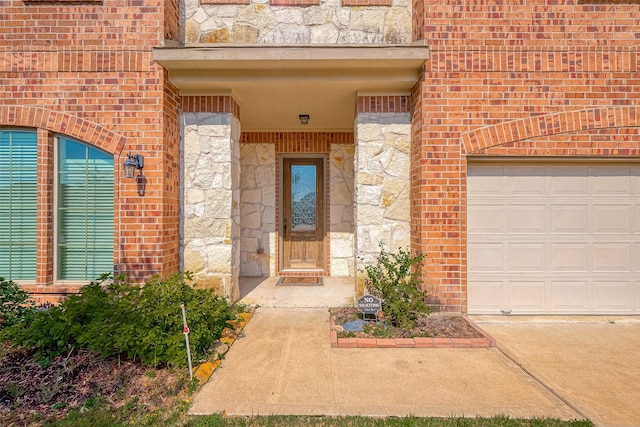 entrance to property featuring a garage