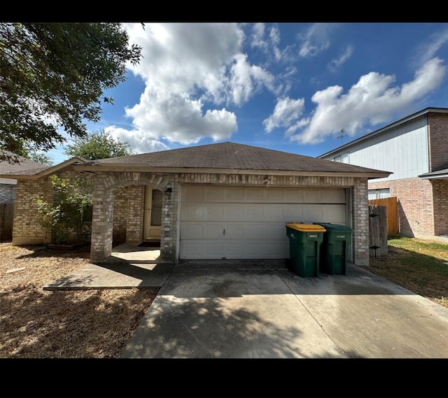 ranch-style home with a garage