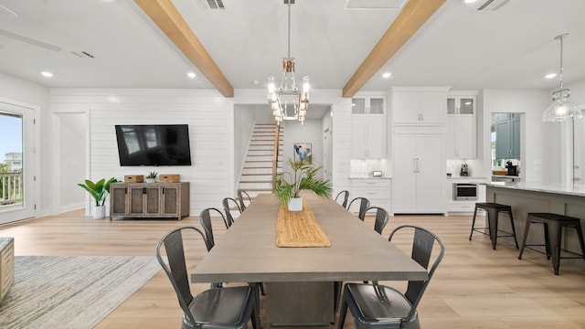 dining space with stairs, light wood-type flooring, beam ceiling, recessed lighting, and a notable chandelier