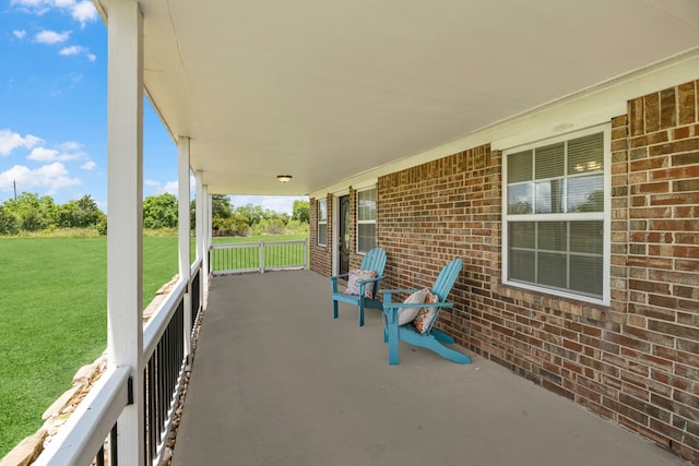 view of patio featuring covered porch