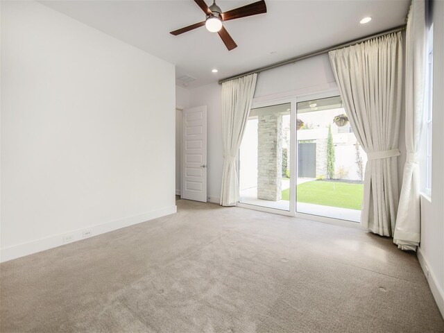 empty room featuring ceiling fan