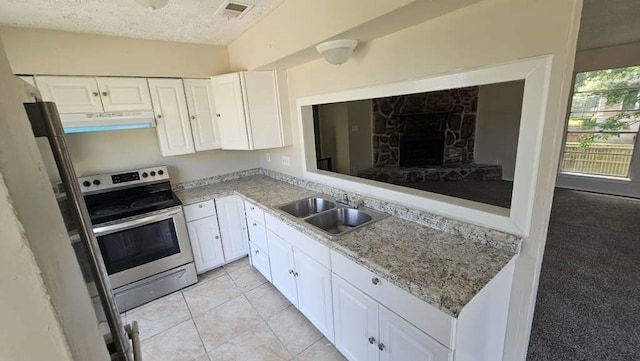 kitchen featuring electric stove, light colored carpet, white cabinets, extractor fan, and sink