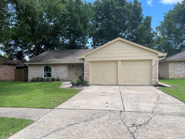 ranch-style house featuring an attached garage, brick siding, driveway, and a front lawn