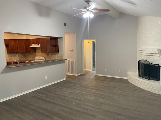 unfurnished living room with a fireplace, visible vents, and dark wood-type flooring