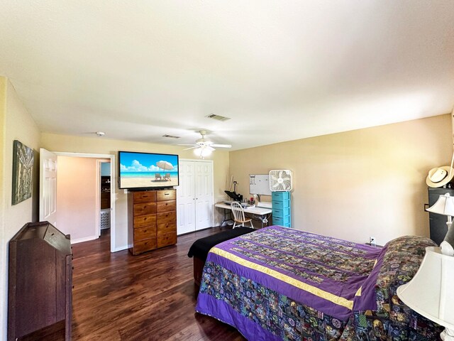 bedroom featuring wood-type flooring, a closet, and ceiling fan