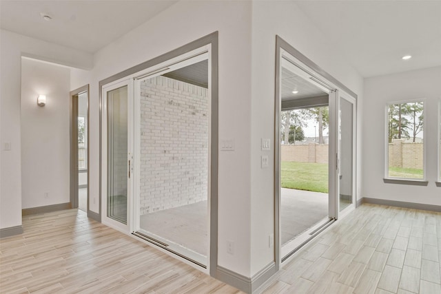 entryway with light wood-type flooring