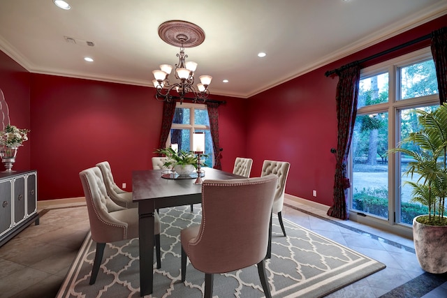 dining area with crown molding, a notable chandelier, and light tile patterned floors