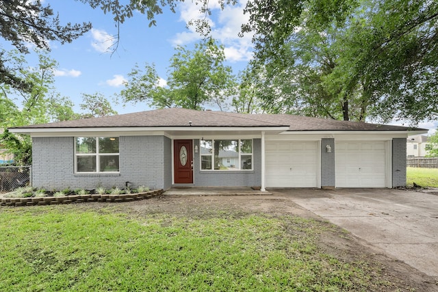 ranch-style house featuring a garage