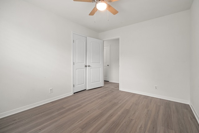 unfurnished room with ceiling fan and light hardwood / wood-style flooring