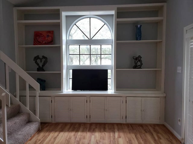 unfurnished living room featuring light hardwood / wood-style flooring