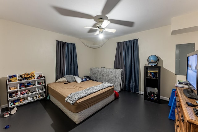 bedroom featuring ceiling fan, baseboards, and concrete flooring