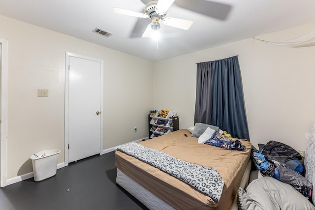 bedroom featuring finished concrete flooring, baseboards, visible vents, and a ceiling fan