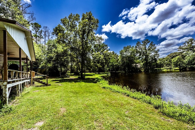 view of yard with a water view