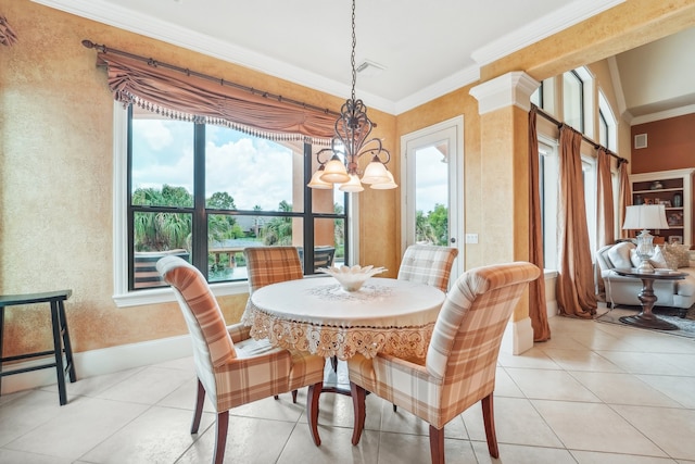 tiled dining space with crown molding and an inviting chandelier