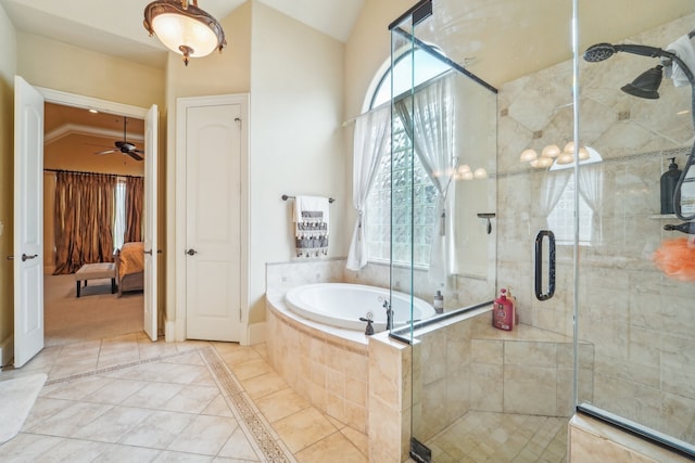 bathroom featuring tile patterned floors, independent shower and bath, vaulted ceiling, and ceiling fan