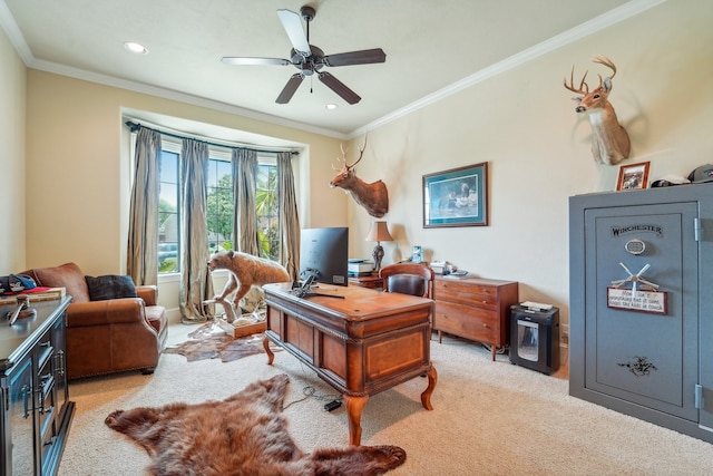 office space featuring ornamental molding, light carpet, and ceiling fan