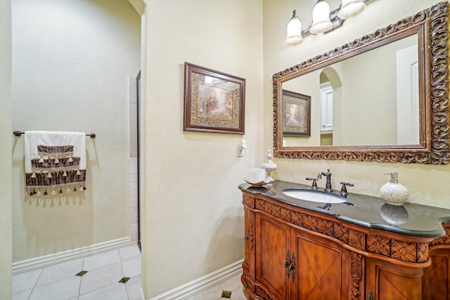 bathroom featuring tile patterned floors and vanity