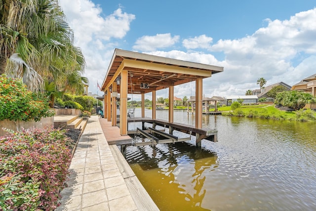 dock area featuring a water view