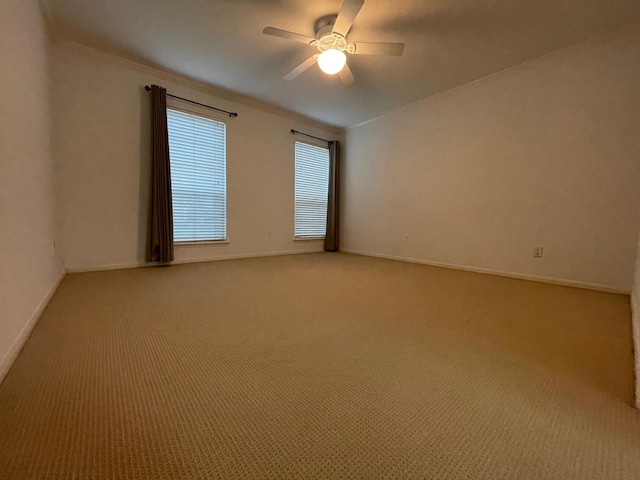 carpeted empty room with ceiling fan