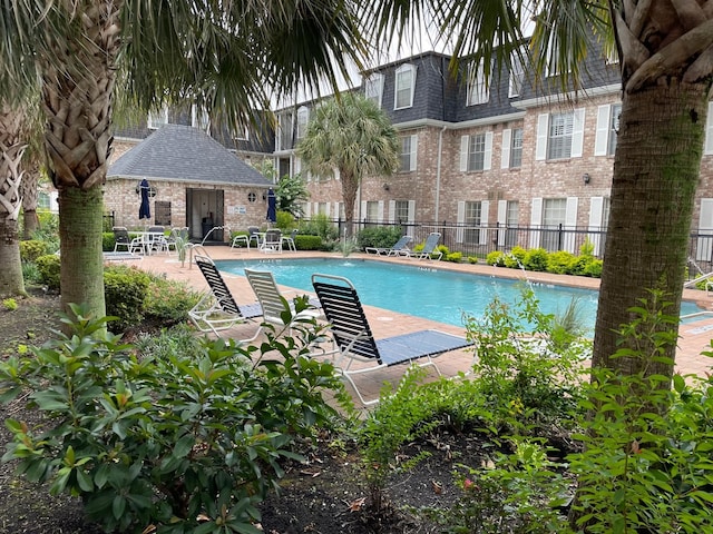 view of swimming pool featuring a patio