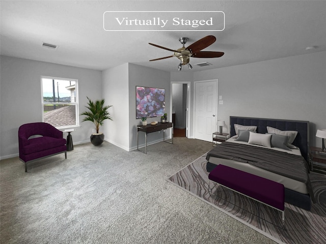 carpeted bedroom featuring ceiling fan