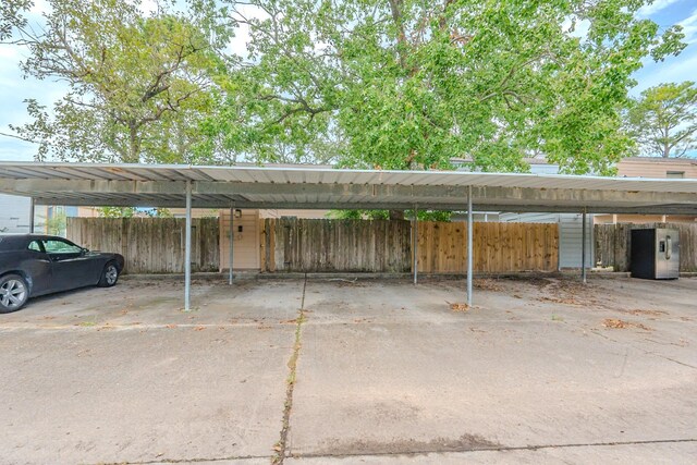 view of parking featuring a carport