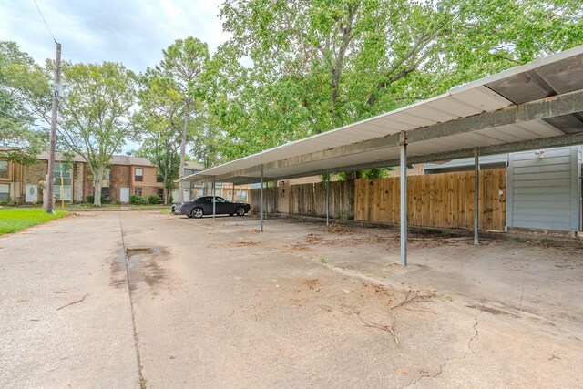 view of parking featuring a carport