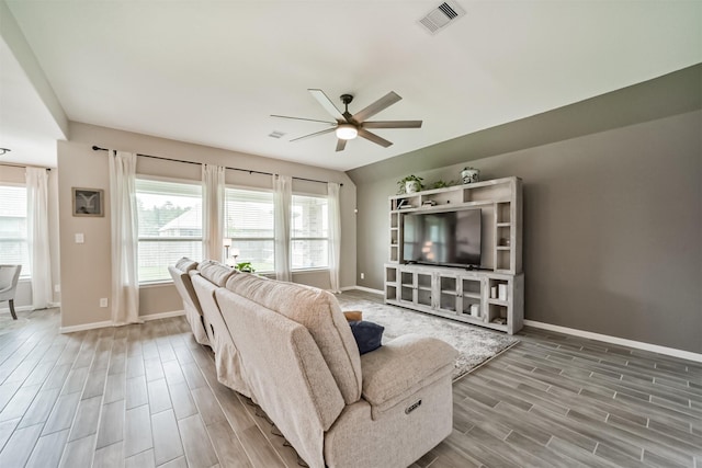 living room featuring ceiling fan