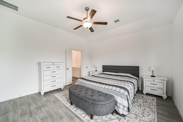 bedroom with ceiling fan and connected bathroom