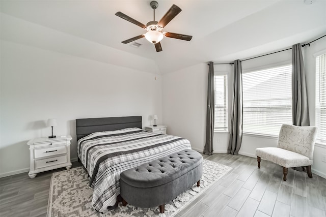 bedroom featuring ceiling fan and light hardwood / wood-style flooring