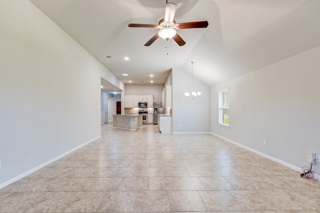 unfurnished living room with vaulted ceiling and ceiling fan with notable chandelier