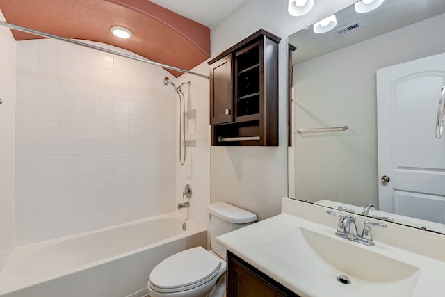 full bathroom with vanity, tub / shower combination, and toilet