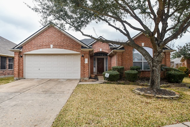 single story home with a garage and a front yard