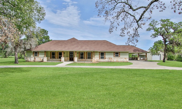 ranch-style home with a porch, a carport, and a front yard