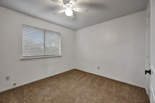 unfurnished room featuring carpet and ceiling fan