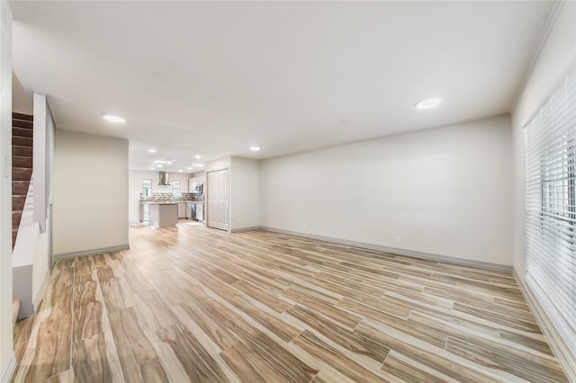 unfurnished living room with light hardwood / wood-style floors