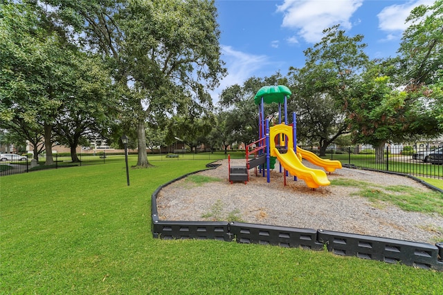 view of playground with a yard