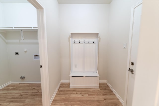 mudroom with light wood-type flooring and baseboards