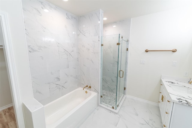 full bathroom with vanity, baseboards, marble finish floor, a marble finish shower, and a bath