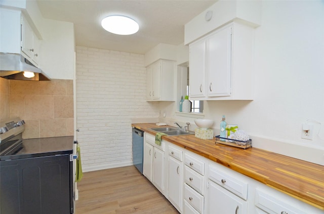16711 David Glen Dr, Friendswood, TX 77546 - kitchen featuring stainless steel appliances, under cabinet range hood, butcher block counters, a sink, and white cabinets