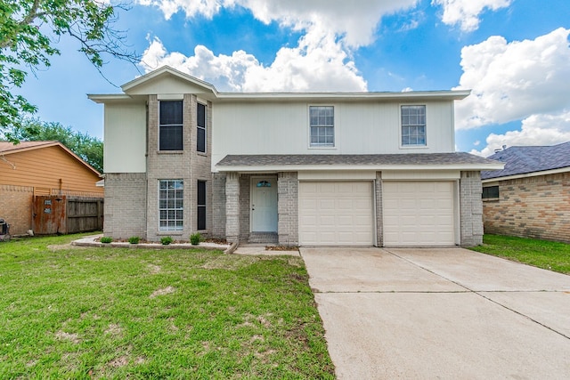 front of property with a front yard and a garage